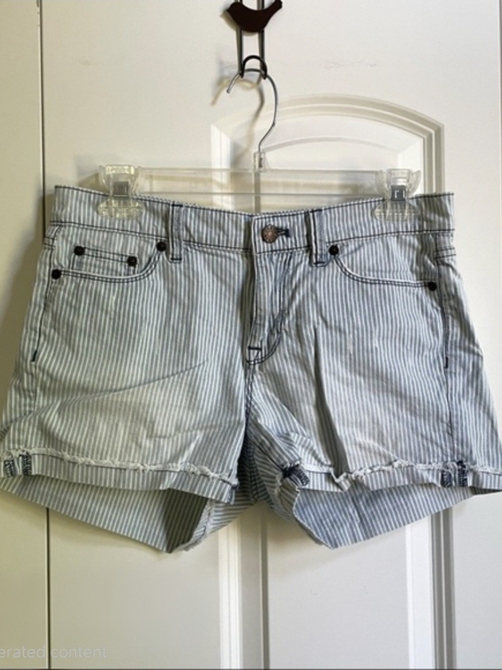 J.Crew striped denim shorts feature a distressed, light-wash pinstripe design